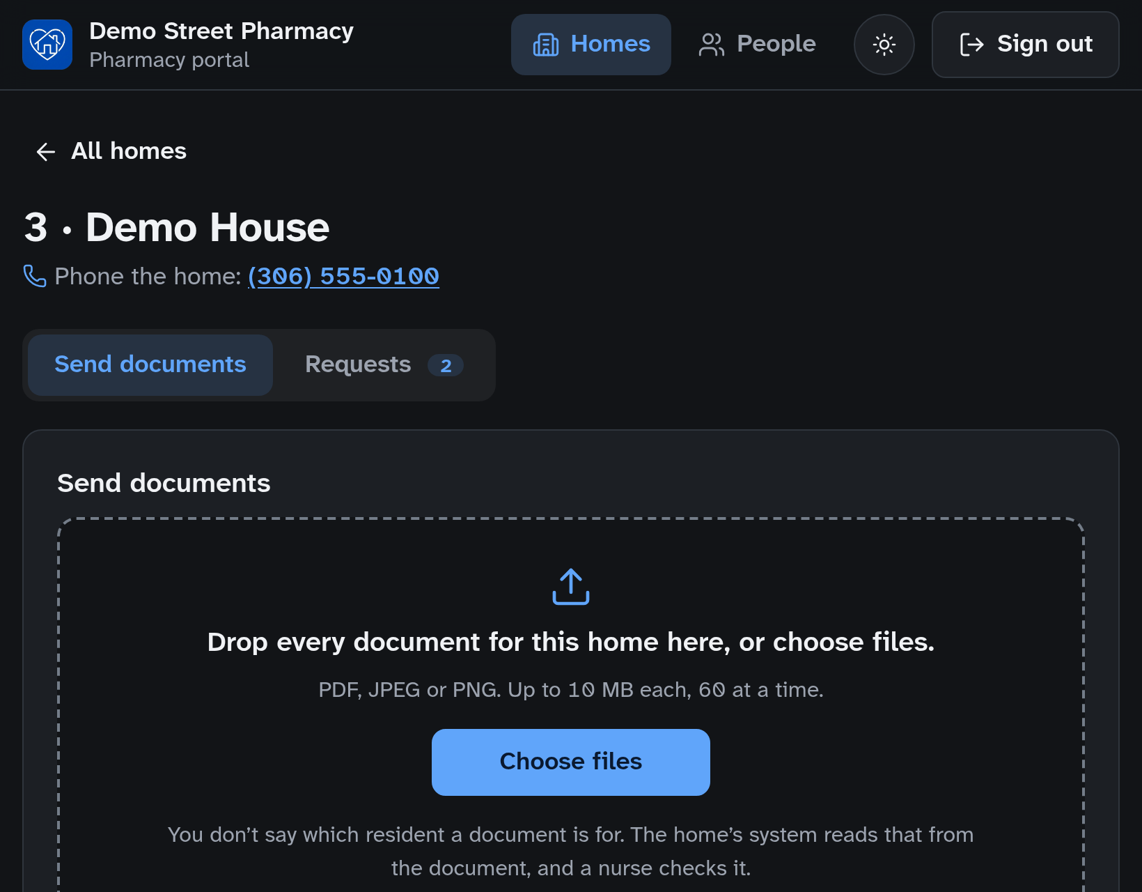 The same home in the pharmacy portal in dark mode.